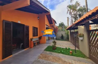 Casa térrea em condomínio a venda- 4 suítes- bertioga-sp