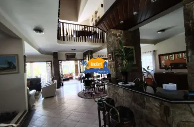 Luxuosa casa em condomínio fechado frente ao mar em bertioga-sp: 4 quartos, 4 suítes, 8 banheiros, 6 vagas, 630m².