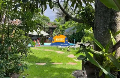 Luxuosa casa de condomínio à venda em bertioga-sp, costa do sol: 100 mts da praia, 5 suítes, 200m² construidos e 600 m² area total.