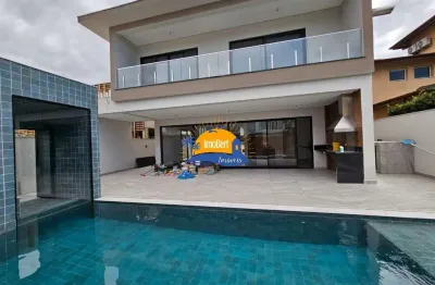 Luxuosa casa de condomínio à venda em bertioga-sp: 4 suítes, 3 salas, 2 banheiros, 4 vagas e 400m² de pura sofisticação em maitinga!