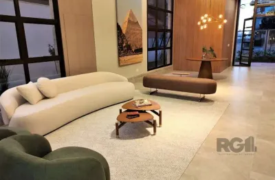 Lindo apartamento 2 dormitórios com 2 suítes, lavabo, vaga de garagem, amplo living 2 ambientes e cozinha com churrasqueira.