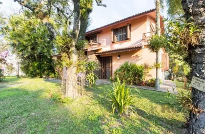 Casa com 4 quartos à venda na Rua Itapitocaí, --, Cristal, Porto Alegre