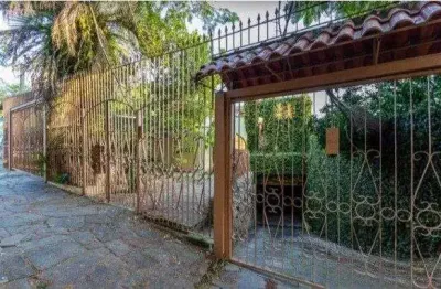 Casa no bairro vila assunção com 4 dormitórios sendo 1 suíte e vista para o guaíba