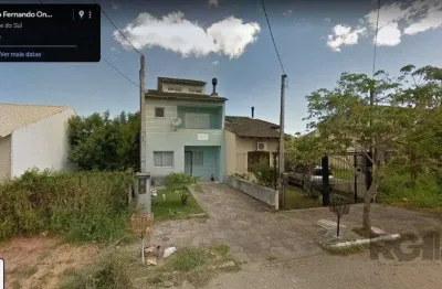 Casa, estilo sobrado, com 03 dormitórios (01suíte) e 02 vagas, no bairro Hípica, em Porto Alegre, RS.