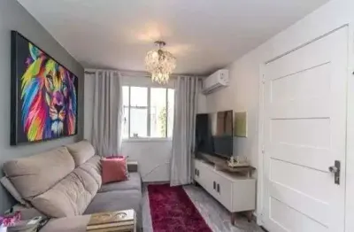 Casa em condomínio fechado com 2 quartos à venda na Rua Tenente Ary Tarrago, --, Jardim Itu Sabará, Porto Alegre