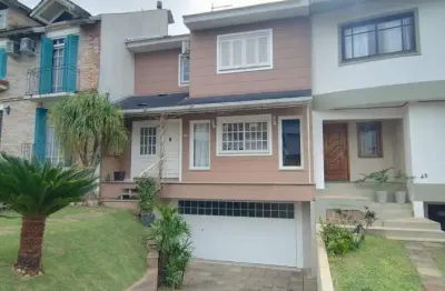 Casa em condomínio fechado com 3 quartos à venda na Rua Adriano Pereira da Silva, --, Vila Nova, Porto Alegre