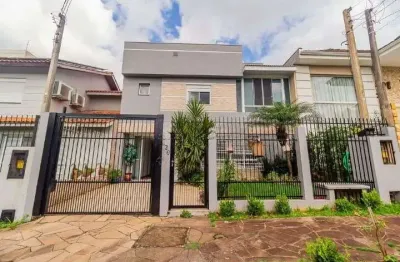Casa em condomínio fechado com 3 quartos à venda na Rua Ronaldo Molina de Quadros, --, Mário Quintana, Porto Alegre