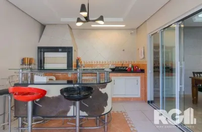 Casa em condomínio com 3 suítes, espaço gourmet e 5 vagas de garagem