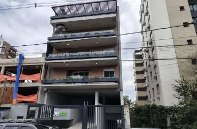 Apartamento garden de 2 dormitórios, 1 suíte e 2 vagas de garagem.