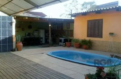 Casa com 4 quartos à venda na Rua Paulo Rubilar de Farias, --, Restinga, Porto Alegre