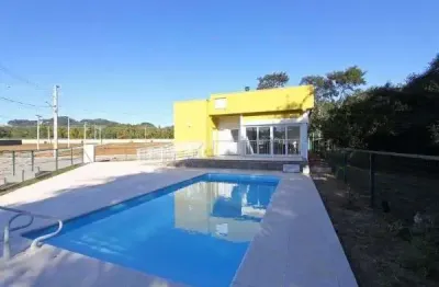Terreno em condominio em porto alegre, no bairro campo novo, à venda.