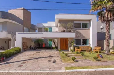 Espetacular casa de condomínio com 3 suítes, piscina com aquecimento