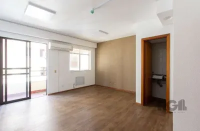 Excelente sala comercial, muito bem localizada no bairro menino deus, 01 banheiro, sacada e ar condicionado split, toda montada
