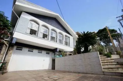 Casa com 3 quartos à venda na Rua Paulino Chaves, --, Santo Antônio, Porto Alegre