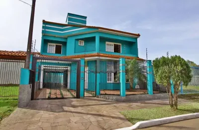 Casa com 3 quartos à venda na Rua Santo Expedito, --, Parque Santa Fé, Porto Alegre