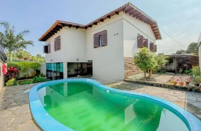 Casa com 3 quartos à venda na Avenida Clemenciano Barnasque, --, Teresópolis, Porto Alegre