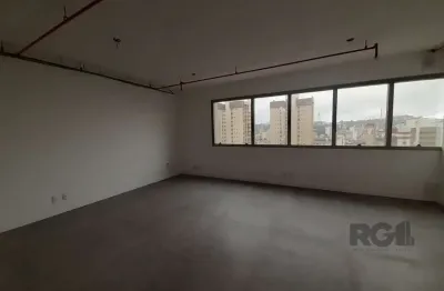 Excelente sala comercial no menino deus, com uma vaga de garagem.