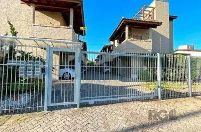 Casa condominio em porto alegre, no bairro guarujá, com 2 dormitório(s), e 2 ban