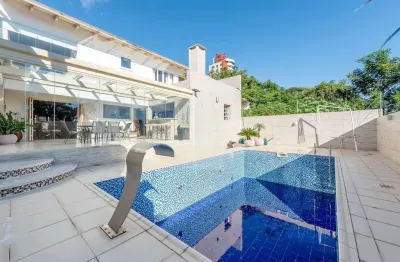 Casa com 5 dormitórios, suíte master e piscina no jardim planalto