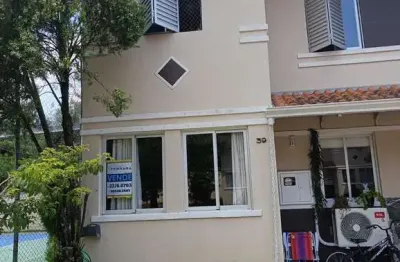 Casa em condomínio fechado de 3 dormitórios,2 vagas no bairro Parque Santa Fé.