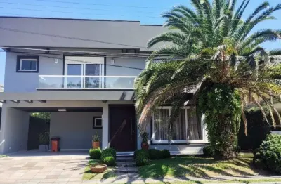 Casa em condomínio fechado com 4 quartos à venda na Avenida Interbalneários, 436, --, Atlântida, Xangri-Lá