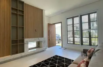 Casa em condomínio fechado com 3 quartos à venda na Rua Rio Divisa, --, Atlântida, Xangri-Lá