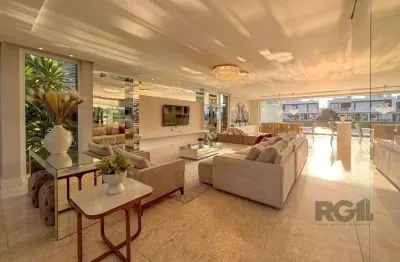 Excepcional sobrado 5 dormitórios com 5 suítes, totalmente mobiliado e ricamente decorado a beira lago em xangrilá, no condomínio enseada.