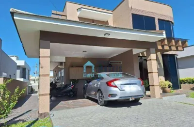 Casa de alto padrão, 3 suítes e piscina à venda, 290 m² por r$ 1.590.000 - condomínio marítimo - tramandaí/rs
