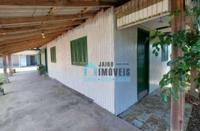 Terreno com 2 casas, uma em alvenaria e uma em madeira, à venda por r$ 110.000 - balneario pinhal - balneário pinhal/rs
