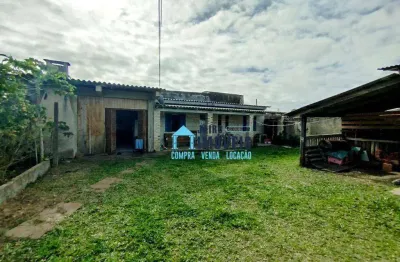 São duas casas em um amplo terreno, boa localização  à venda por r$ 175.000 - centro - balneário pinhal/rs