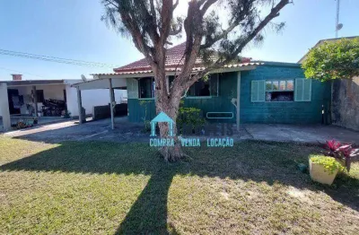 Chalé de madeira com terreno amplo e arborizado em balneário pinhal!