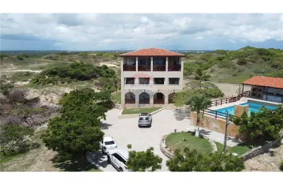 Mansão pé na areia ceará: 7 suítes, lazer de resort e spa privativo na cobertura