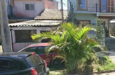 Casa à venda na Rua Elvira Dendena, 606, Hípica, Porto Alegre