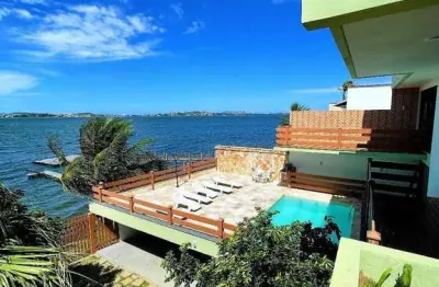 Aluguel pé na areia de casa cinematográfica com 4 quartos ,  piscina e mais
