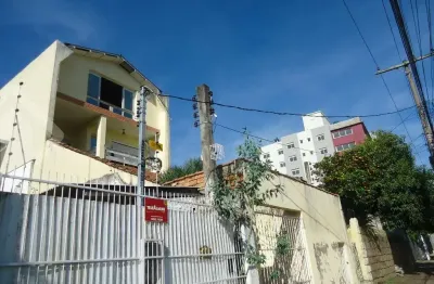Casa em condomínio fechado com 7 quartos à venda na rua teixeira de freitas, 348, santo antônio, porto alegre, 539 m2 por r$ 583.000