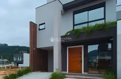 Casa em condomínio fechado com 3 quartos à venda na avenida deltaville, 301, beira rio, biguaçu, 132 m2 por r$ 1.199.000