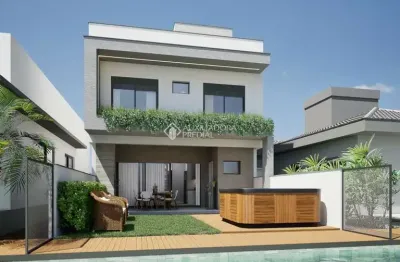 Casa em condomínio fechado com 3 quartos à venda na avenida deltaville, 301, beira rio, biguaçu, 144 m2 por r$ 1.299.000