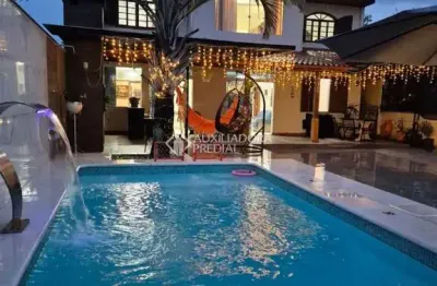 Casa com 4 quartos à venda na Rua Nativa, 100, Praia do Sonho, Palhoça, 270 m2 por R$ 1.300.000