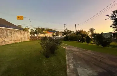Terreno à venda na avenida deputado diomício freitas, 1, carianos, florianópolis, 1098 m2 por r$ 1.200.000