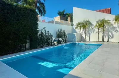 Casa com 5 quartos à venda em jurerê internacional, florianópolis  por r$ 7.850.000