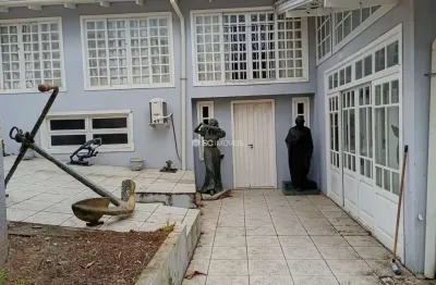 Casa em condomínio fechado com 4 quartos à venda no Ingleses, Florianópolis  por R$ 960.000