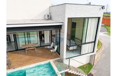 Casa térrea com 4 suítes no condomínio ibiti reserva, 256 m2 a.c e terreno cm 409 m2