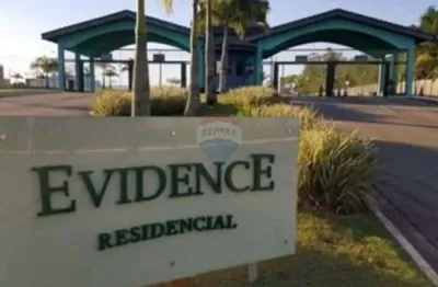 Alugo casa mobiliada  no condomínio evidence com 3 suítes e piscina