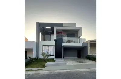 Casa de alto padrão no sun lake spa: 3 suítes, piscina, acabamentos premium e conforto total