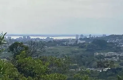 Terreno à venda na Estrada Jorge Pereira Nunes, 1689, Campo Novo, Porto Alegre