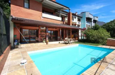 Casa com 4 dormitórios, sendo 1 suíte, com 2 vagas cobertas, no bairro nonoai, p