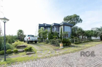 Casa em condomínio 4 dormitórios à venda vila nova porto alegre/rs