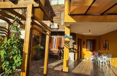 Casa com 4 quartos à venda na Rua Baldoino Bottini, 392, Hípica, Porto Alegre