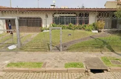 Casa com 4 quartos à venda na Rua Jacipuia, 201, Guarujá, Porto Alegre