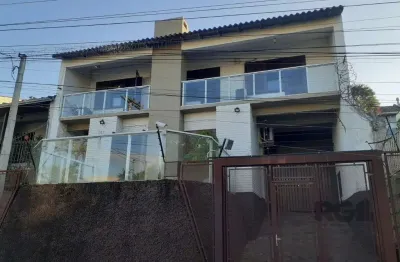 Casa com 3 quartos à venda na Rua Eurico Lara, 505, Medianeira, Porto Alegre